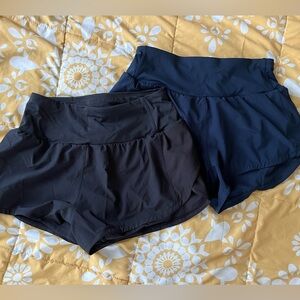 Two pairs lined running shorts